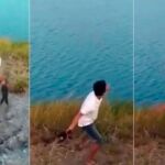 El horrible momento en el que un hombre arroja un cachorro a un lago lleno de cocodrilos en Australia