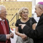 El Padre Ángel, Manuela Carmena y el arzobispo de Madrid, Carlos Osoro
