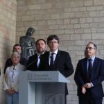 Puigdemont y varios exconsellers durante una rueda de prensa previa al 1-O
