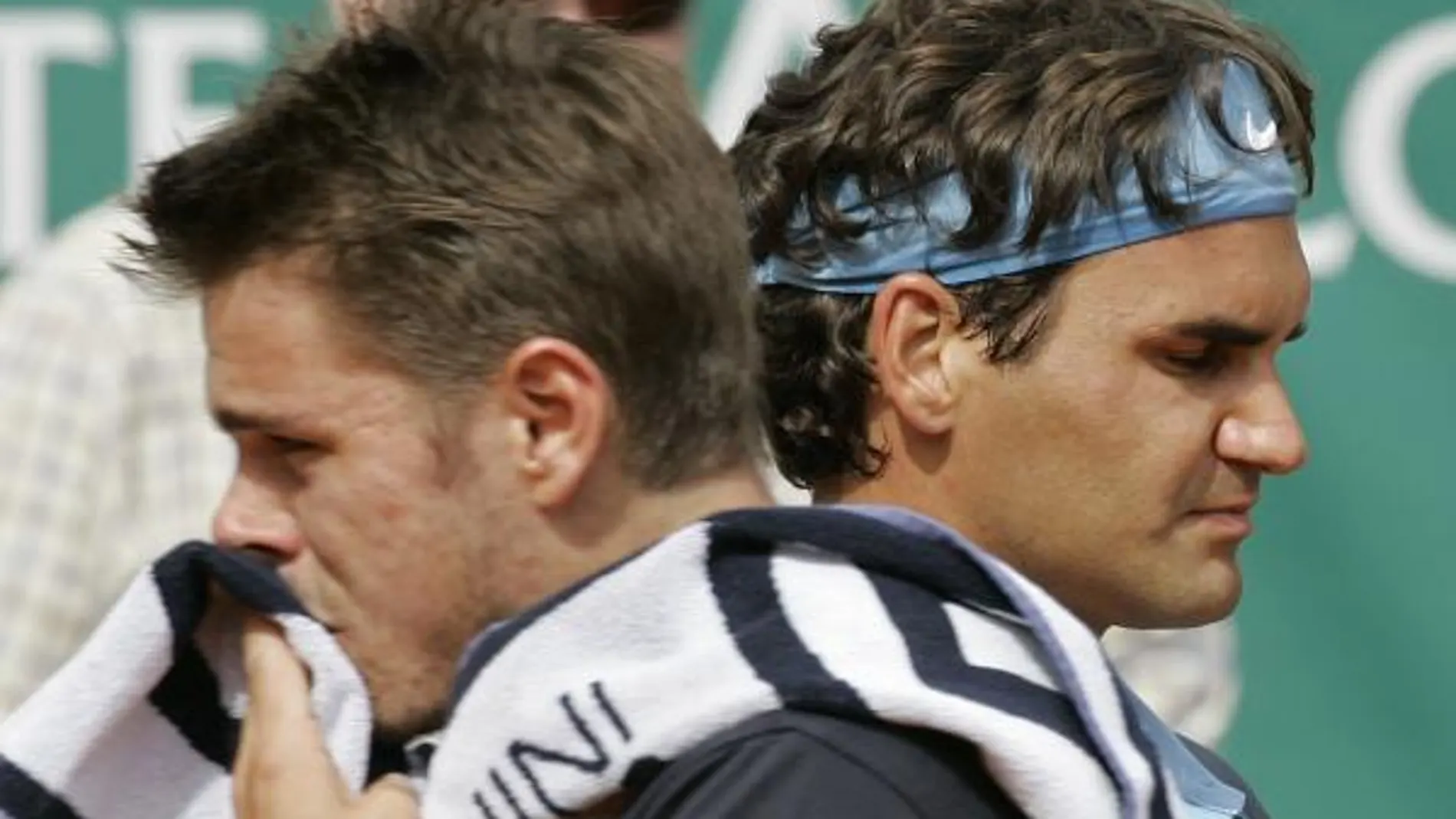 El tenista suizo Roger Federer y su compatriota Stanislas Wawrinka