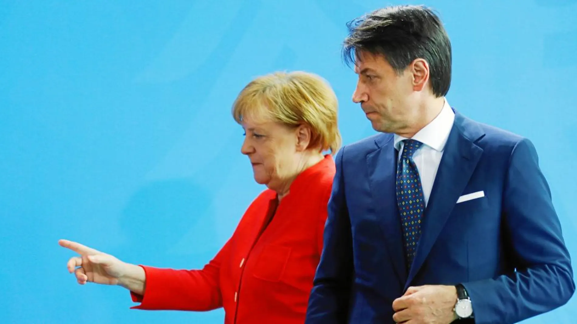 La canciller alemana, Angela Merkel, y el primer ministro italiano, Giuseppe Conte, tras la rueda de prensa ofrecida ayer en Berlín / Reuters
