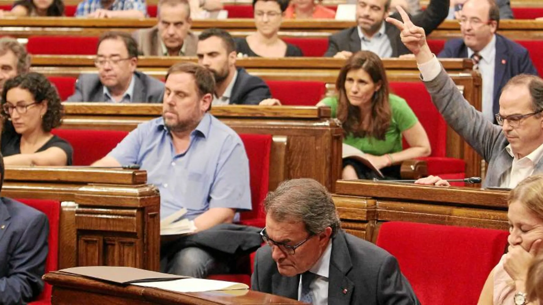 Mas y Junqueras, ayer en el Parlament, horas después de presentar su lista conjunta para las elecciones del 27-S