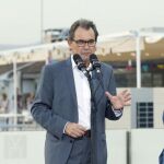 El presidente de la Generalitat y de CDC, Artur Mas y el cabeza de lista, Raül Romeva, durante la presentación de la lista unitaria a favor de la independencia