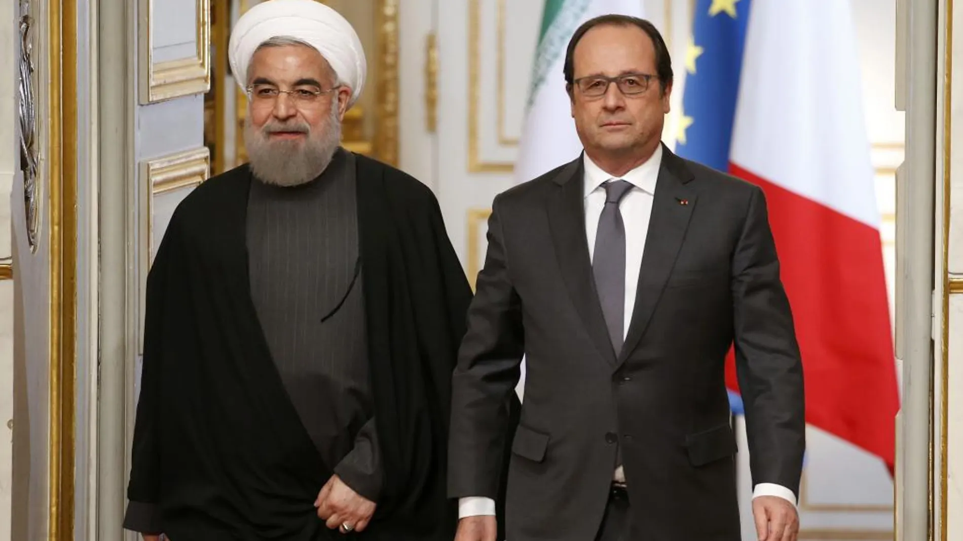 Los presidente de Irán y Francia, Hassan Rouhani y Francois Hollande, en el Palacio del Elíseo