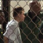 Momento en que el sospechoso entra en prisión. Miami Herald