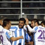 Los jugadores del Málaga celebran su primer gol ante el Eibar en el partido de la vigésima segunda jornada de liga en Primera División