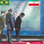Los presidentes de Irán, Mahmud Ahmadineyad, y de Brasil, Luiz Inacio Lula da Silva, durante el saludo protocolario previo a su encuentro