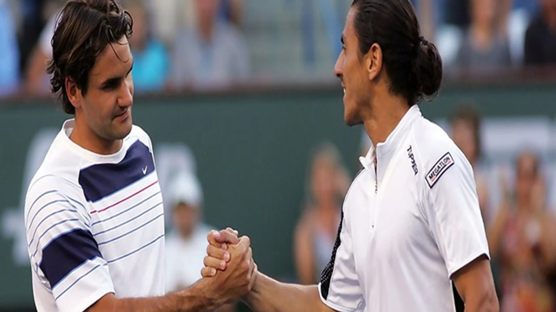 Roger Federer y Guillermo Cañas