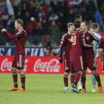 Los jugadores rusos celebran la victoria conseguida ante Montenegro