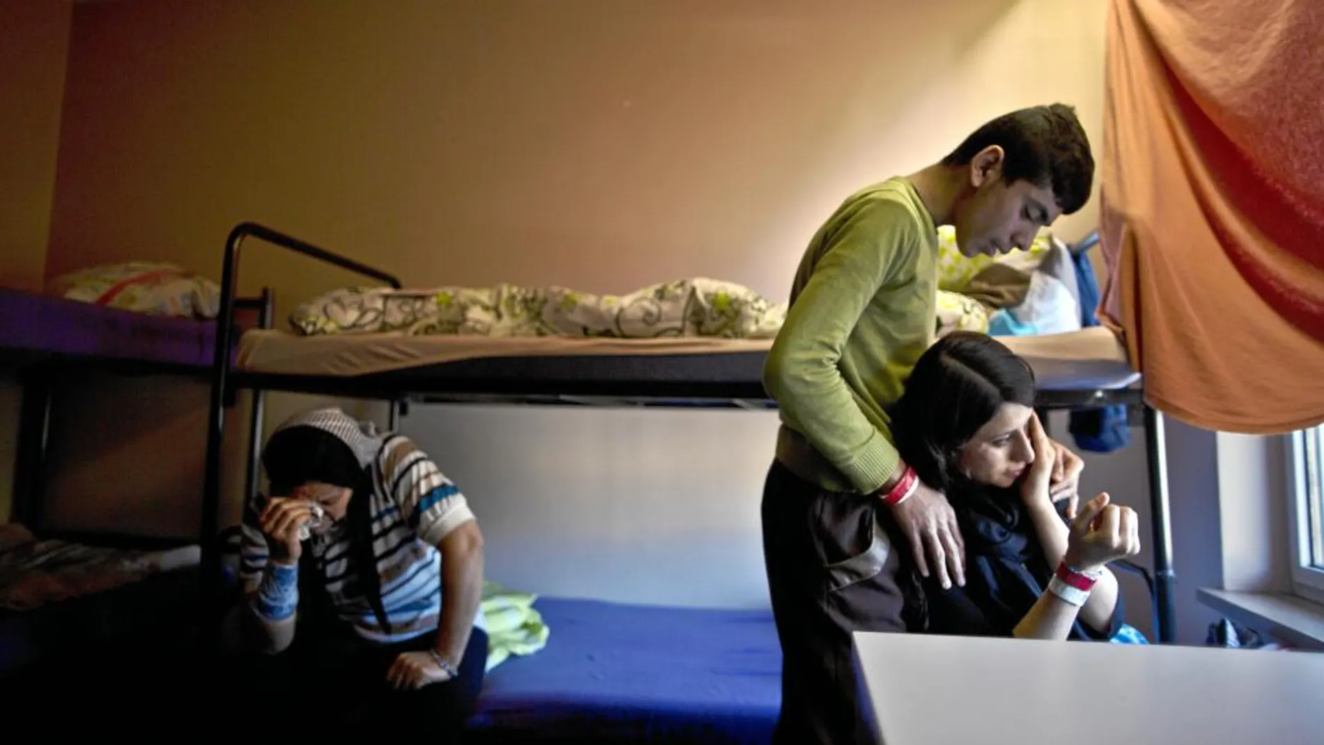 Una familia de refugiados yazidíes provenientes de la ciudad iraquí de Sinyar, en un albergue de Heidelberg