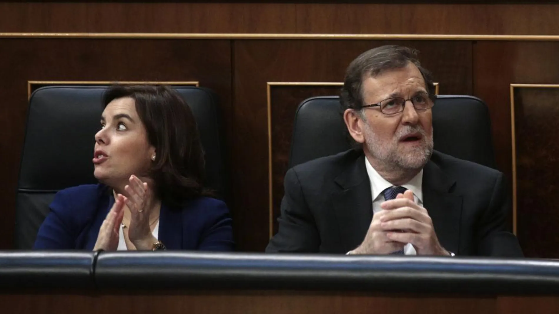 El presidente del Gobierno en funciones, Mariano Rajoy, y la vicepresidenta Soraya Sáenz de Santamaría