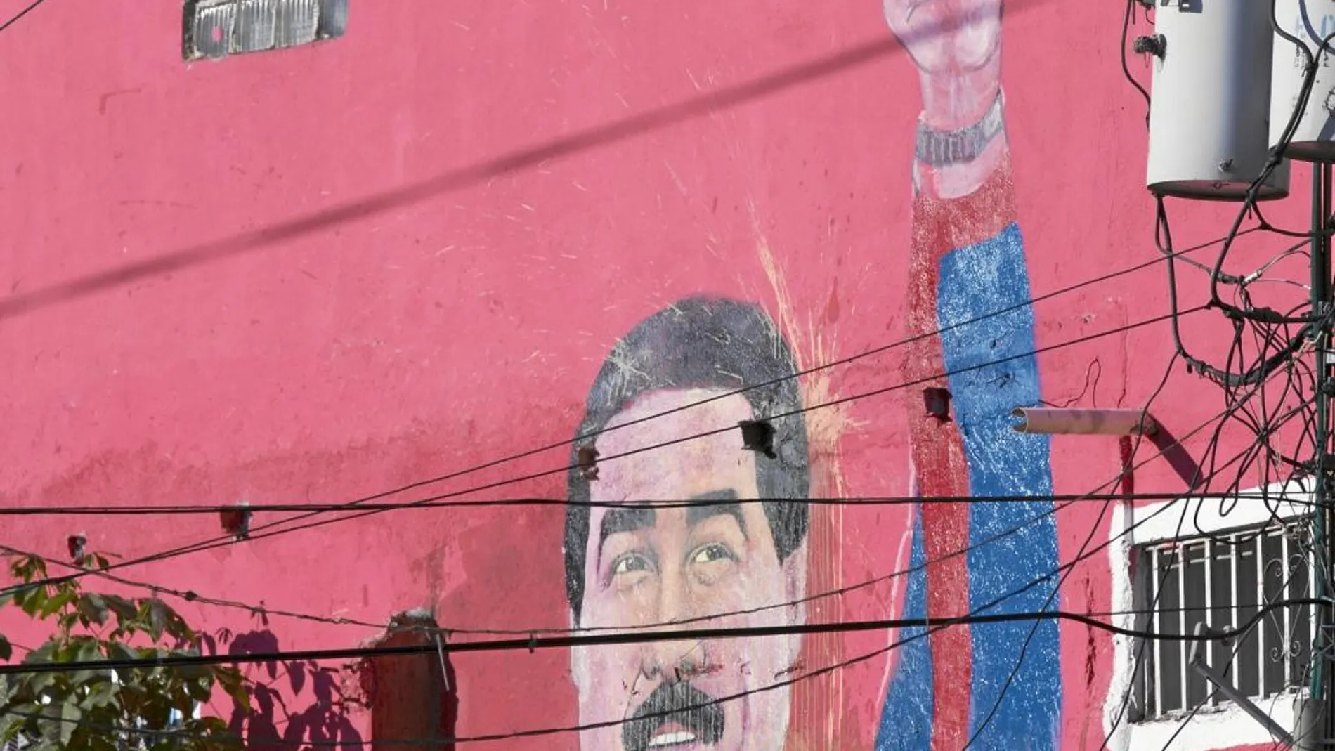 Un mural con el rostro de Nicolás Maduro en el popular barrio caraqueño de Pétare