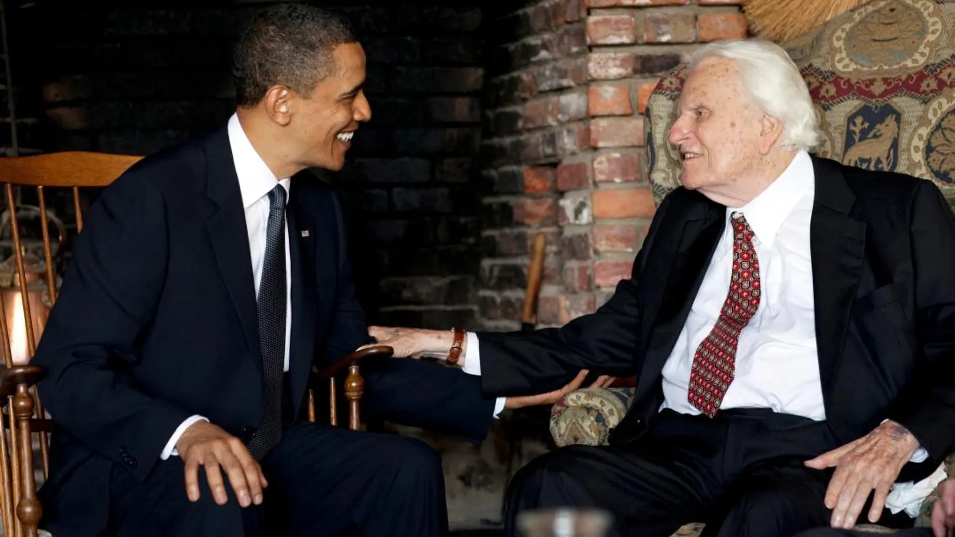 Barack Obama con el reverendo Billy Graham/Reuters