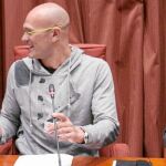 Raül Romeva, en el centro, junto con el presidente en funciones de la Generalitat, Artur Mas, y Oriol Junqueras