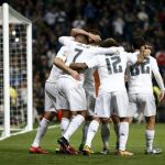 Los jugadores del Real Madrid celebran un gol de Cristiano