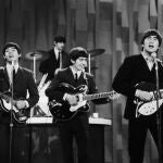 Los Beatles durante su célebre actuación en el show de Ed Sullivan en 1964