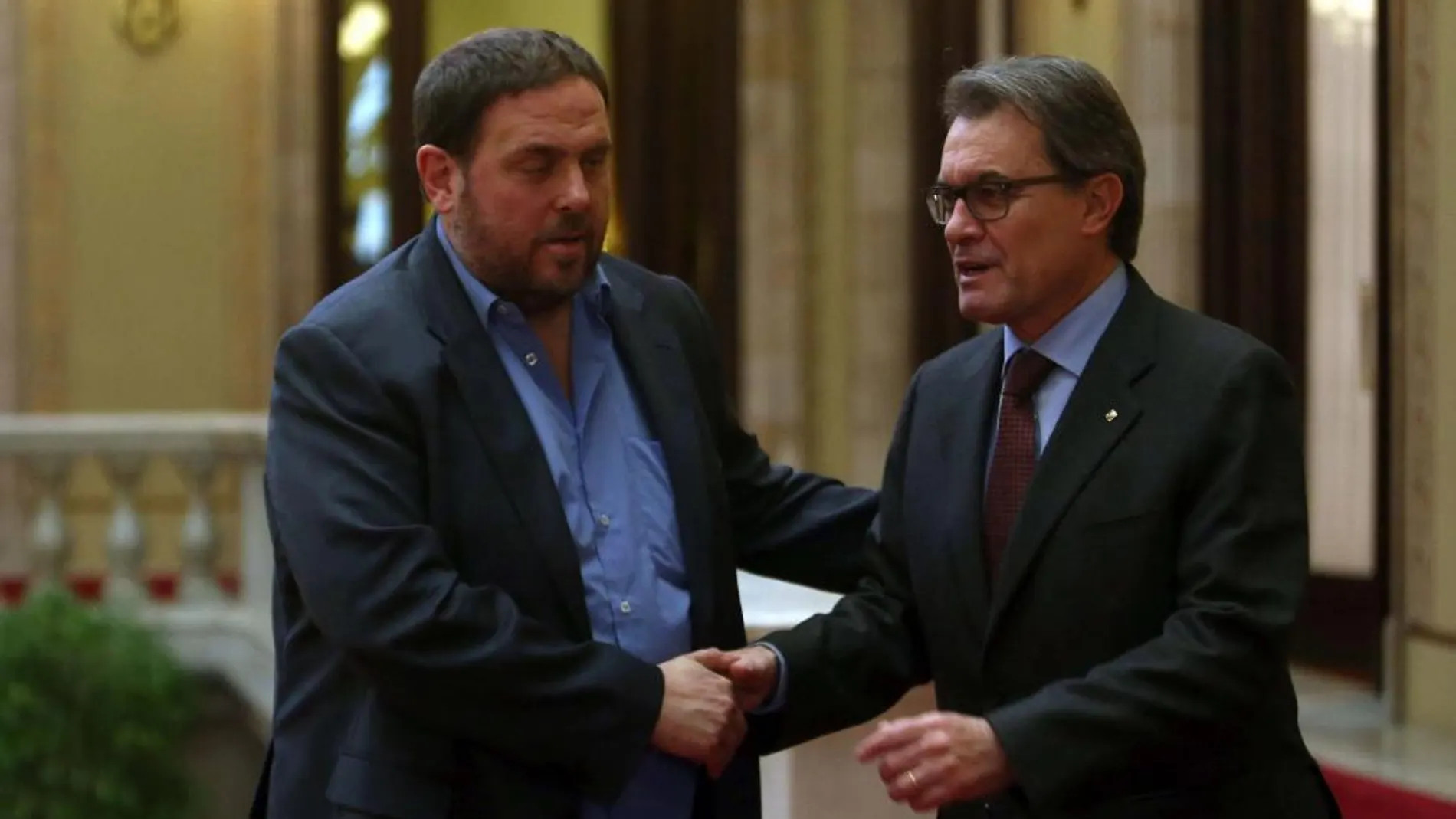 El presidente de la Generalitat, Artur Mas, junto al líder de ERC, Oriol Junqueras