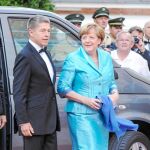 Merkel es fiel a su estilo. Repite corte de vestido año tras año