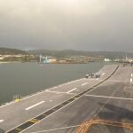 El pie de foto es: El "Príncipe de Asturias"a su llegada a Ferrol tras su última travesía