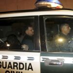 Un coche de la Guardia Civil llegan esta tarde a la Ciudad de la Justicia de Valencia.