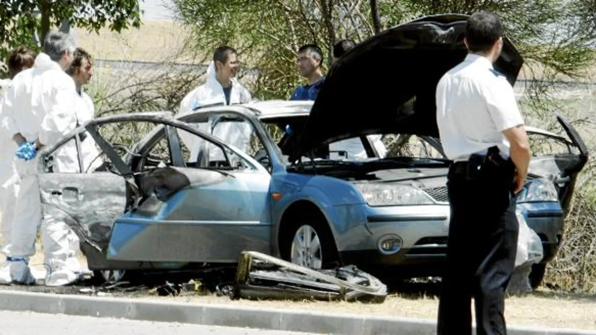 Hallado un cadáver calcinado en el asiento trasero de un coche en Getafe