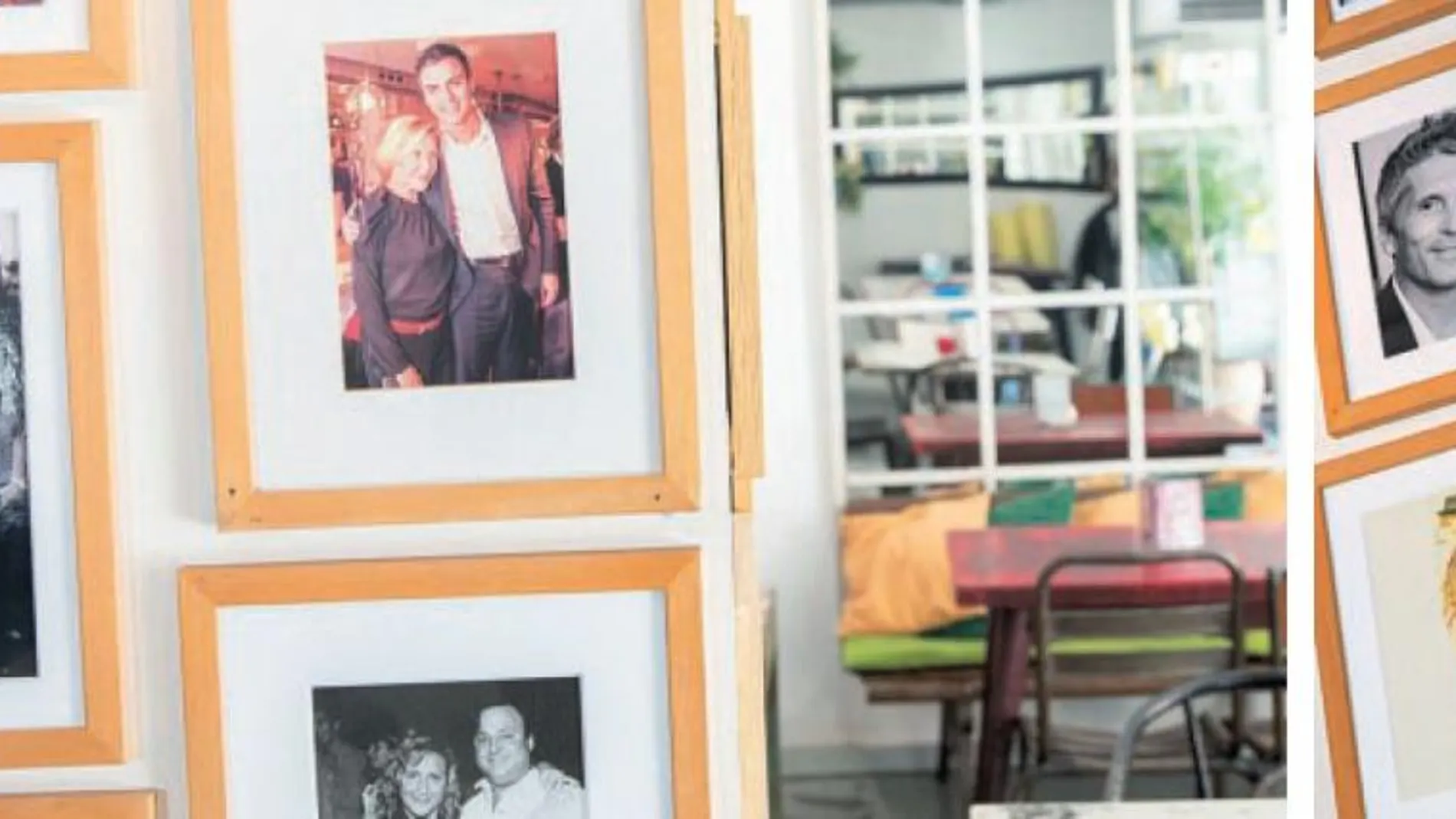 Los retratos de Pedro Sánchez (arriba) y el ministro Grande-Marlaska cuelgan en las paredes del bar restaurante de Chueca / Gonzalo Pérez