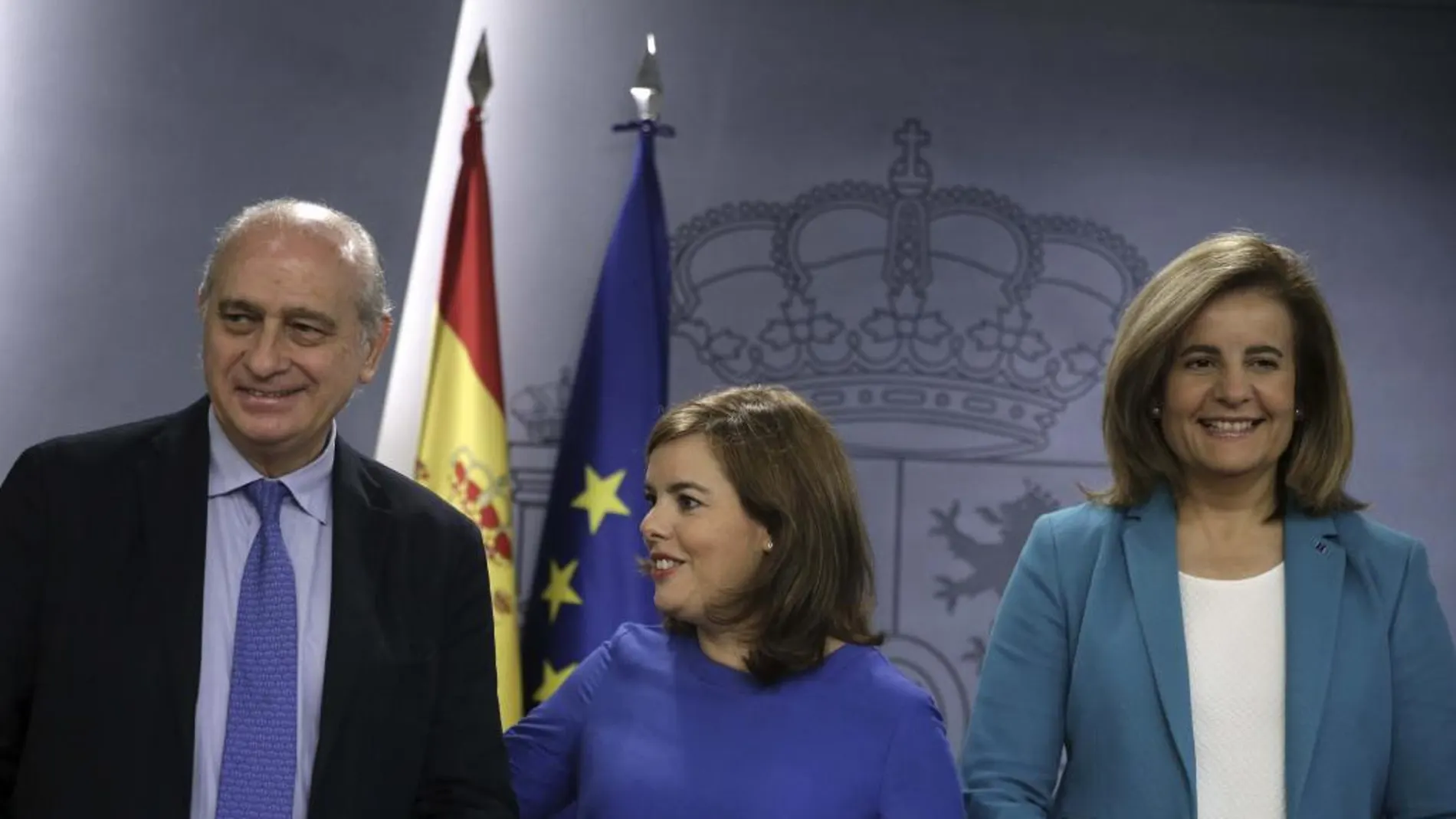 Soraya Sáenz de Santamaría, durante la rueda de prensa ofrecida junto a los ministro Jorge Fernández Díaz y Fátima Báñez