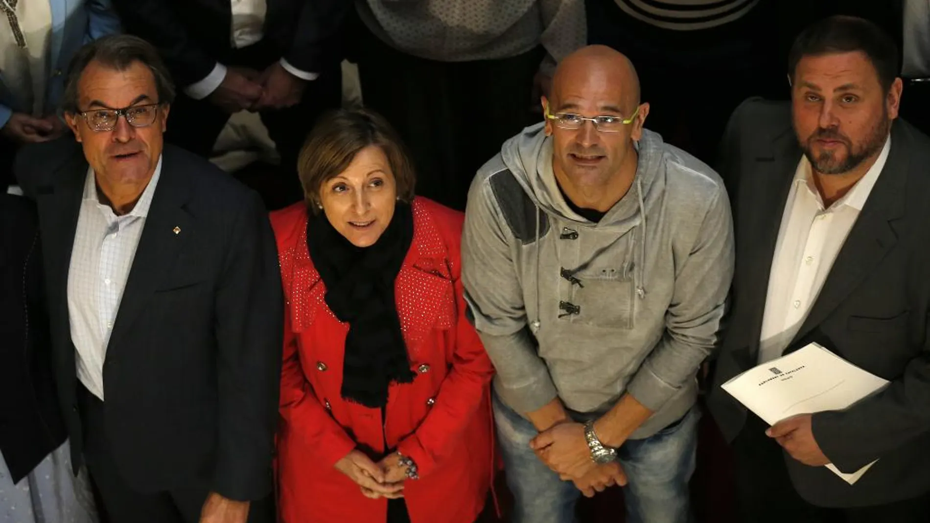 De izquierda a derecha, Artur Mas, Carmen Forcadell, Raúl Romeva y Oriol Junqueras
