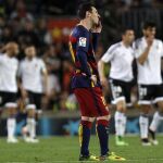 Messi se lamenta después del primer gol del Valencia.