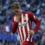 El delantero del Atlético de Madrid Fernando Torres celebra la consecución del primer gol de su equipo ante el Espanyol