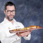 El chef muestra el menú que ha preparado para Historia