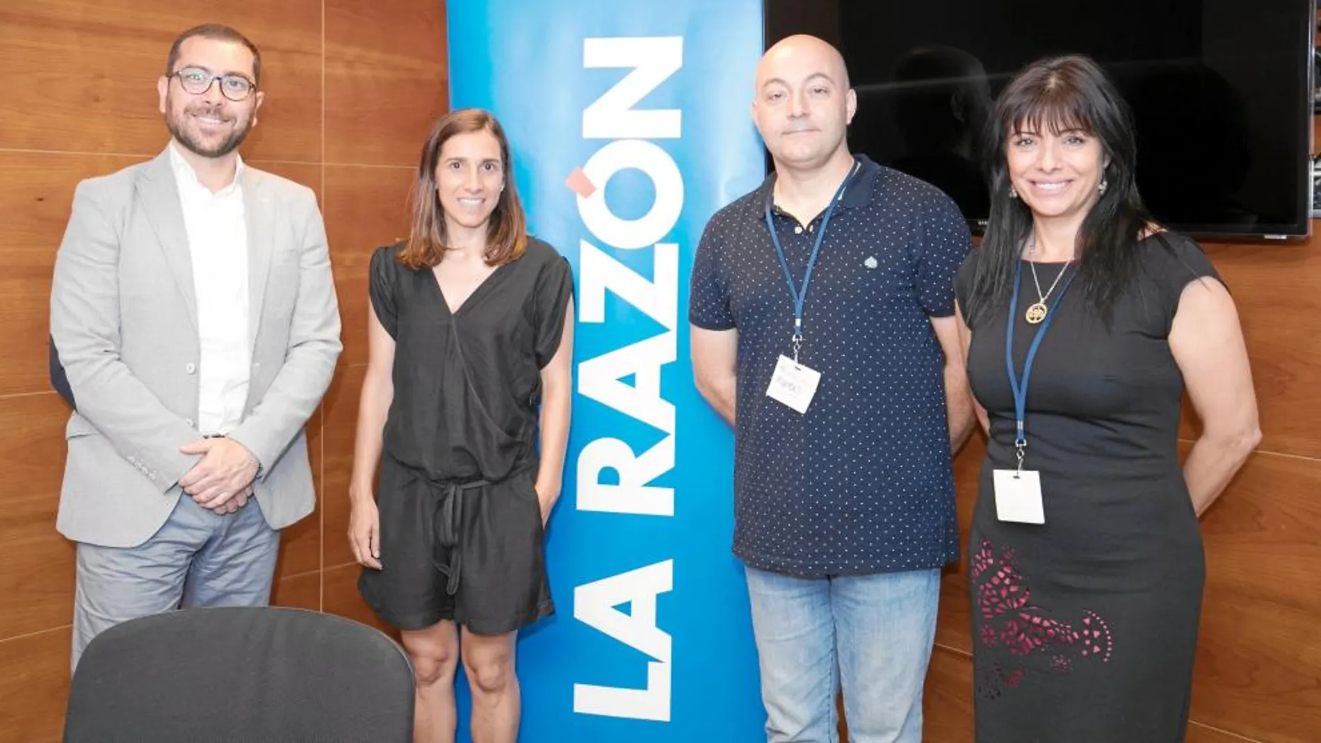 Xavier Pérez, de Purina, Òscar Montoro, de Help Guau, y Alejandra González de Bayer