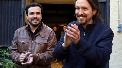 Iglesias y Garzón atienden a los medios tras el preacuerdo electoral alcanzado por ambas formaciones para presentarse a los comicios del 26 de junio.