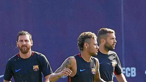 Neymar y Messi, durante el entrenamiento del Barça