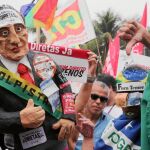 Manifestantes piden ayer en las calles de Río de Janeiro la dimisión del presidente Michel Temer por sus escándalos de corrupción