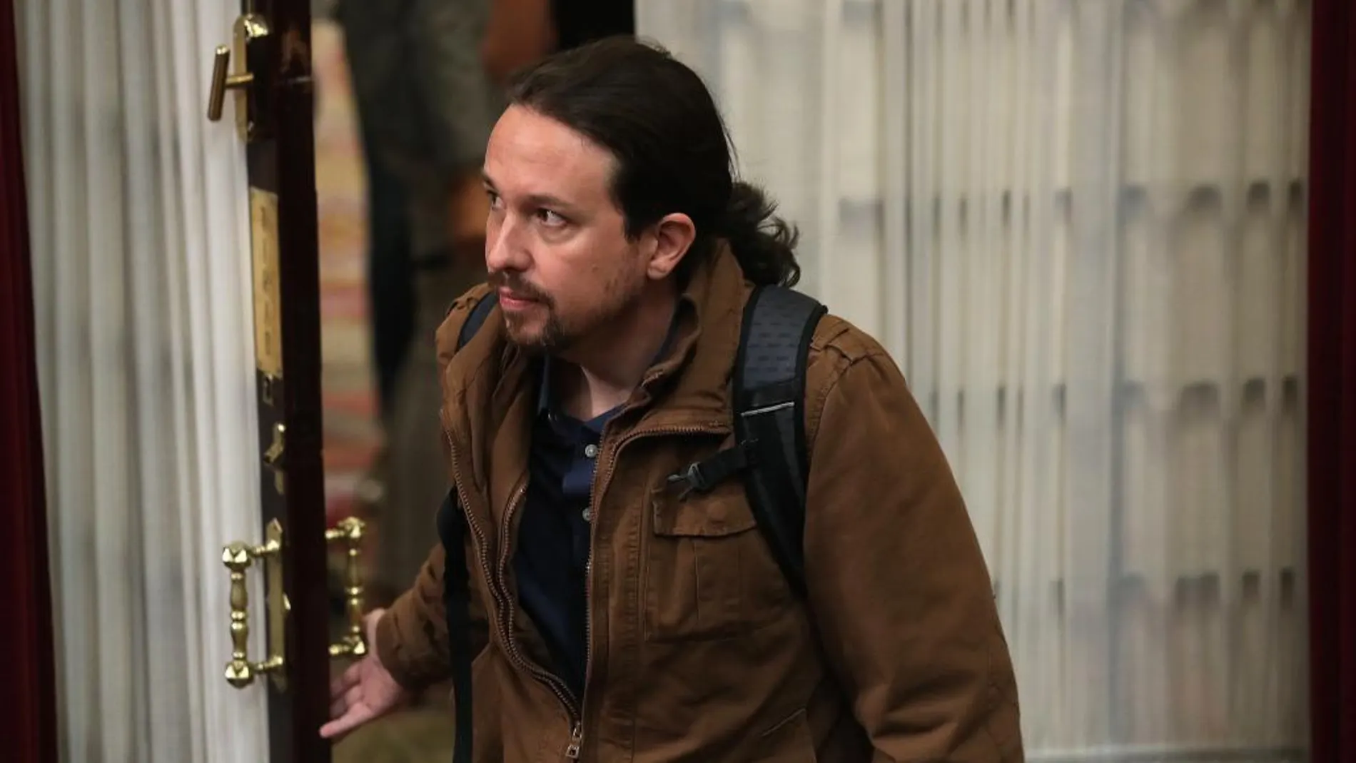 El líder de Unidos Podemos, Pablo Iglesias, a su llegada al pleno que se celebra hoy en el Congreso de los Diptuados