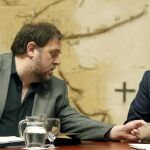 El presidente de la Generalitat, Carles Puigdemont y el vicepresidente Oriol Junqueras