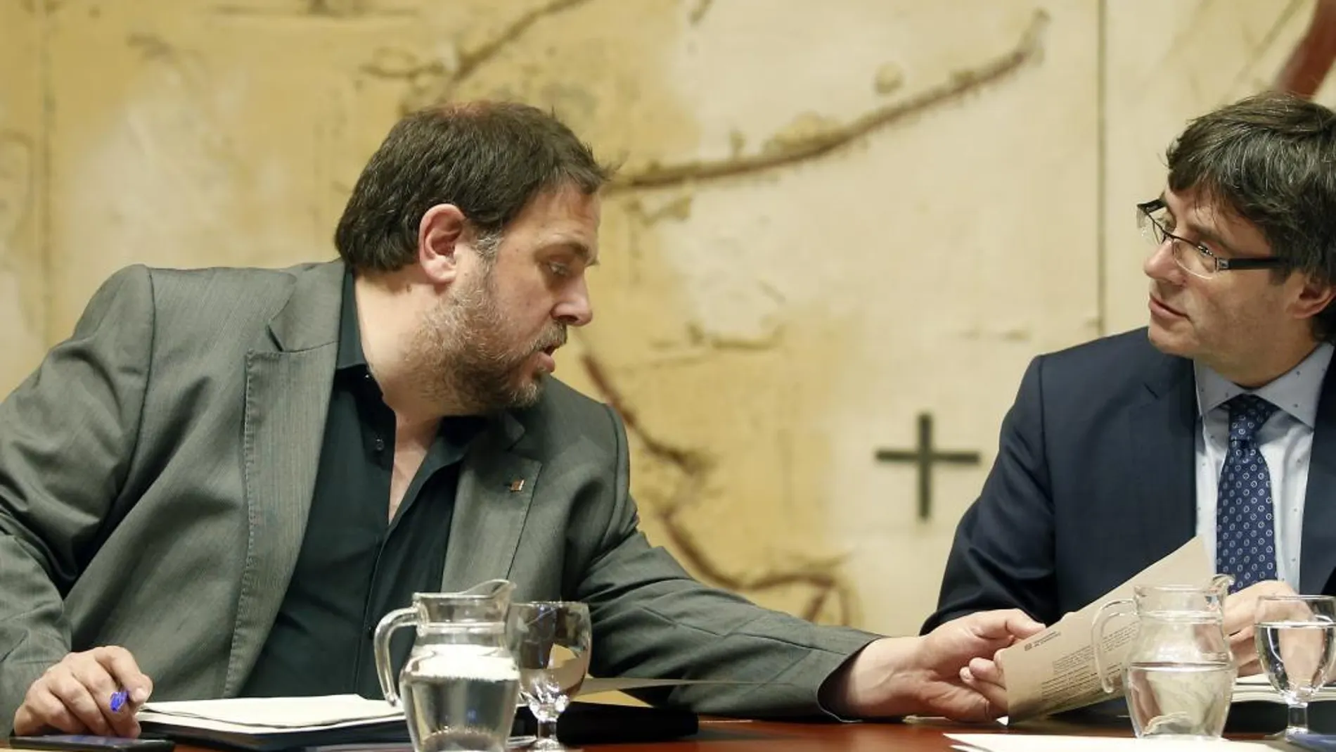 El presidente de la Generalitat, Carles Puigdemont y el vicepresidente Oriol Junqueras