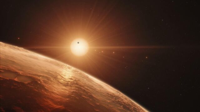 Fotografía facilitada por el Observatorio Europeo Austral (ESO) que muestra una impresión artística de la vista desde la superficie de uno de los planetas del sistema TRAPPIST-1