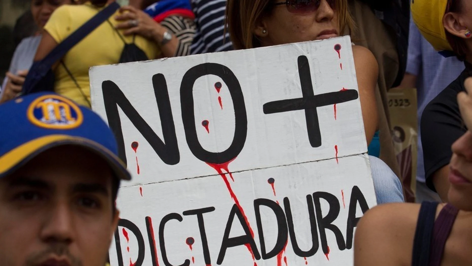 Manifestantes en Caracas en contra del Gobierno de Nicolás Maduro