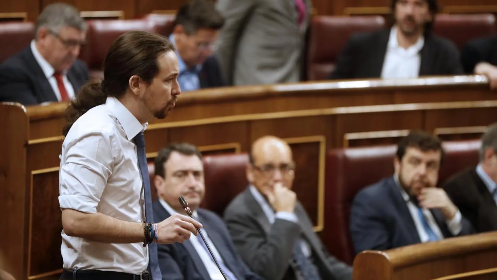El líder de Podemos, Pablo Iglesias, durante su intervención en la sesión de control al Gobierno en el pleno del Congreso de los Diputados