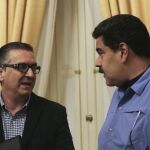 Nicolas Maduro y Miguel Perez Abad