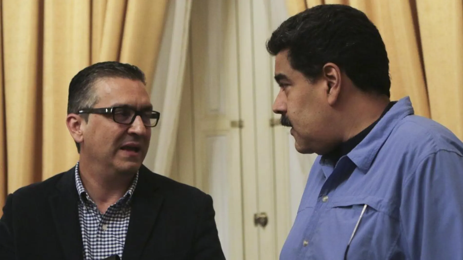 Nicolas Maduro y Miguel Perez Abad