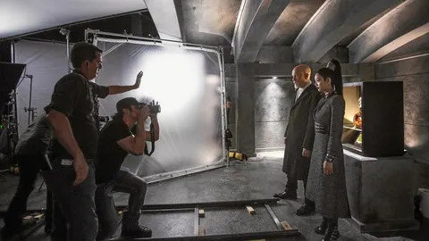 Robert Rodríguez, durante el rodaje con Malkovich y Shuya Chang