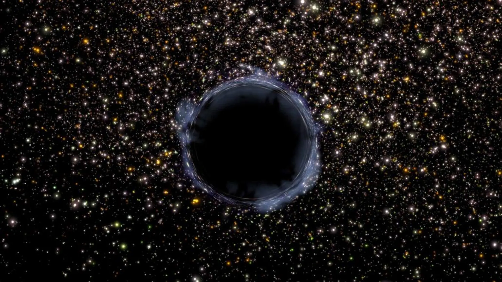 Detectan dos agujeros negros condenados a colisionar