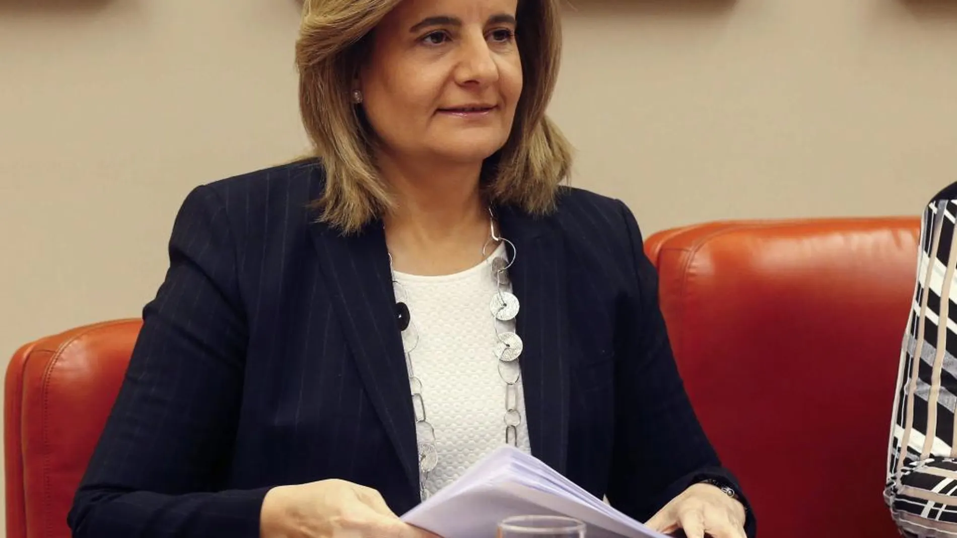 La ministra de Empleo y Seguridad Social, Fátima Báñez, durante su comparecencia ayer en la Comisión del Pacto de Toledo