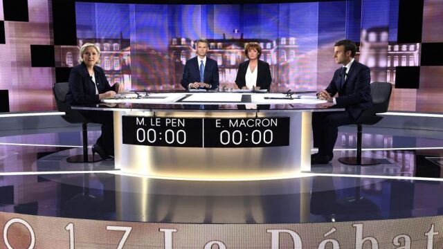 Marine Le Pen y Emmanuel Macron se preparan para el debate televisado.