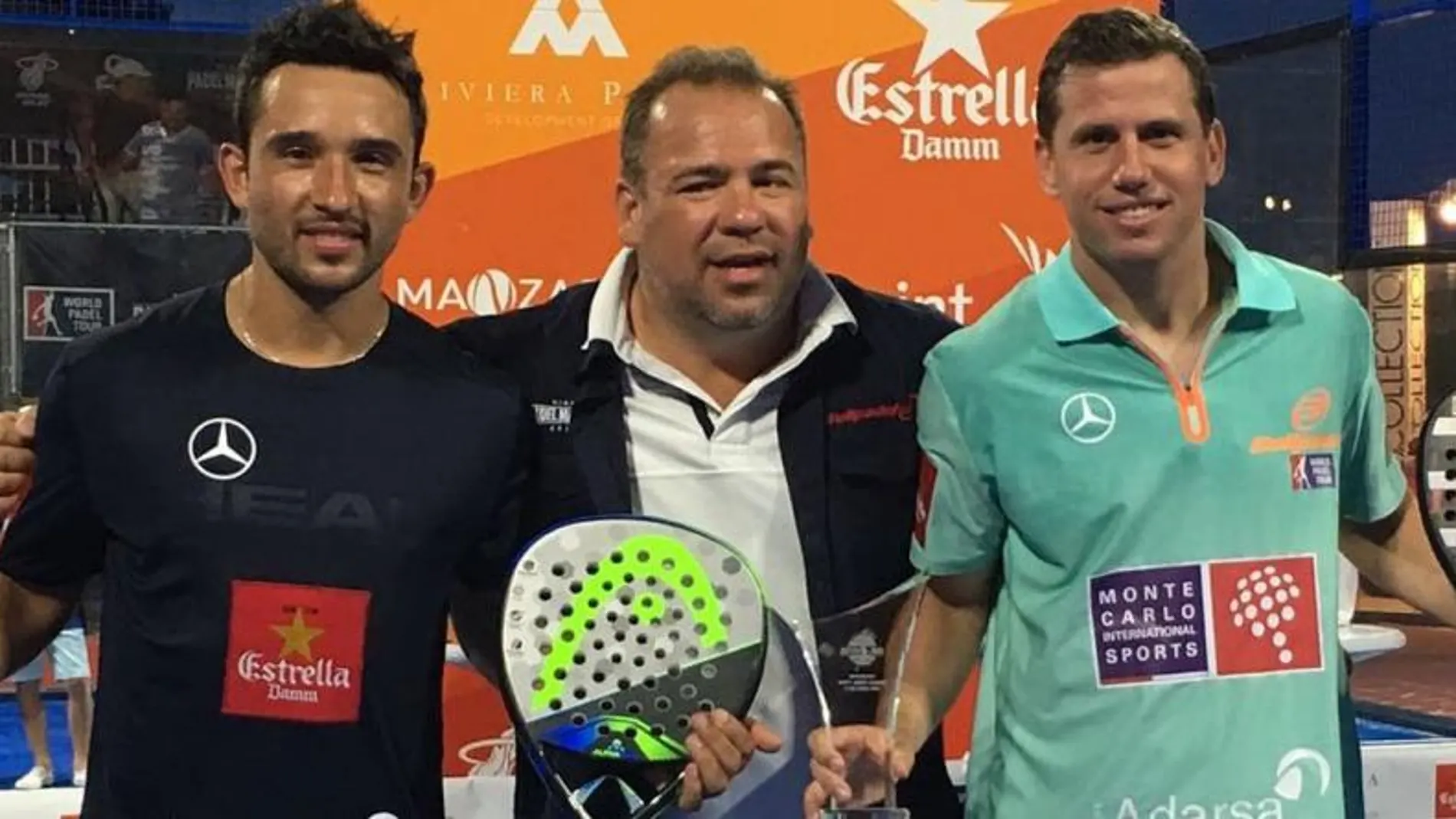 Sanyo Gutiérrez y Paquito Navarro, con el título en Miami