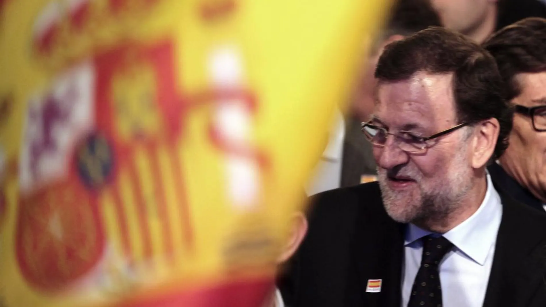 El presidente del Gobierno y candidato del PP a la reelección, Mariano Rajoy, a su llegada al mitin central de su campaña en Aragón