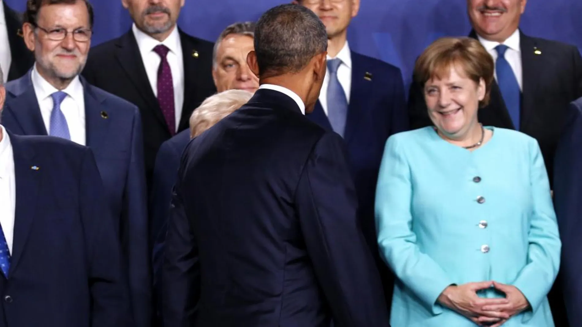 El presidente de EEUU, Barack Obama (c), en presencia del presidente del Gobierno, Mariano Rajoy (i) y la canciller alemana, Angel Merkel (d), entre otros